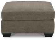 Ashley Furniture Mahoney living room set with sofa and loveseat in neutral upholstery, modern design, and plush cushions.