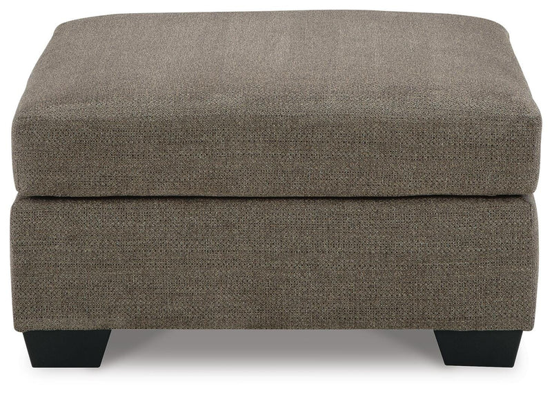 Ashley Furniture Mahoney living room set with sofa and loveseat in neutral upholstery, modern design, and plush cushions.