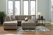 Ashley Furniture Mahoney living room set with sofa and loveseat, upholstered in neutral fabric, modern design for comfortable seating.
