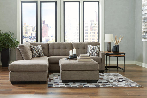 Ashley Furniture Mahoney living room set with sofa and loveseat, upholstered in neutral fabric, modern design for comfortable seating.