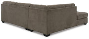 Ashley Furniture Mahoney living room set with sofa and loveseat, featuring plush cushions and coordinated fabric.