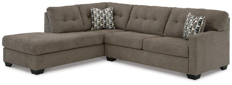Ashley Furniture Mahoney living room set with sofa and armchair in a modern design, shown in a cozy, stylish living space.