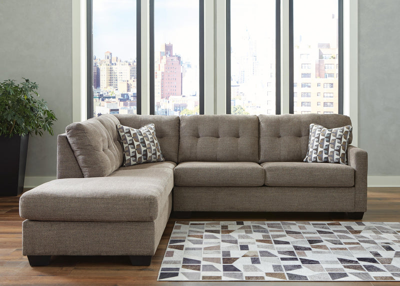 Ashley Furniture Mahoney living room set featuring a sofa and loveseat with neutral upholstery and stylish cushions.