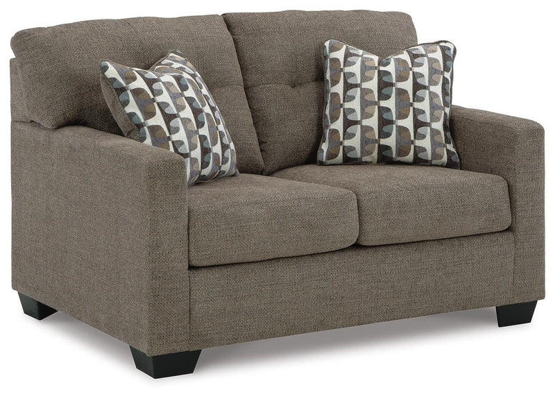 Ashley Furniture Mahoney living room set with sofa and armchair, featuring neutral upholstery and modern design.