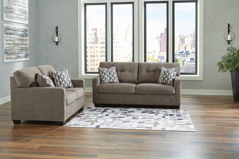 Ashley Furniture Mahoney living room set featuring a sofa and armchair with plush fabric and modern design.