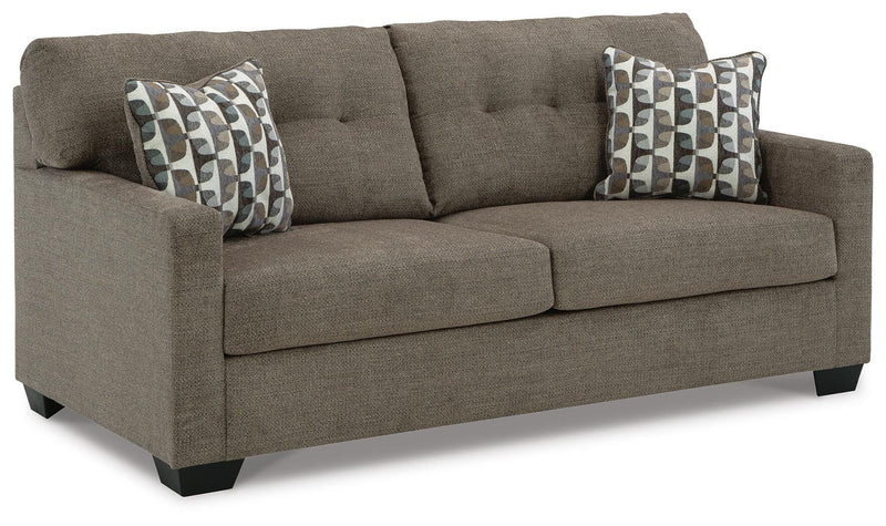 Ashley Furniture Mahoney living room set featuring a sofa and loveseat with plush cushions and modern design, shown from an angled view.