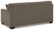 Ashley Furniture Mahoney living room set with sofa and armchair, featuring neutral upholstery and modern design.