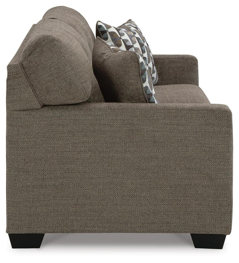 Ashley Furniture Mahoney living room set featuring a sectional sofa and coordinating chairs in a modern design.