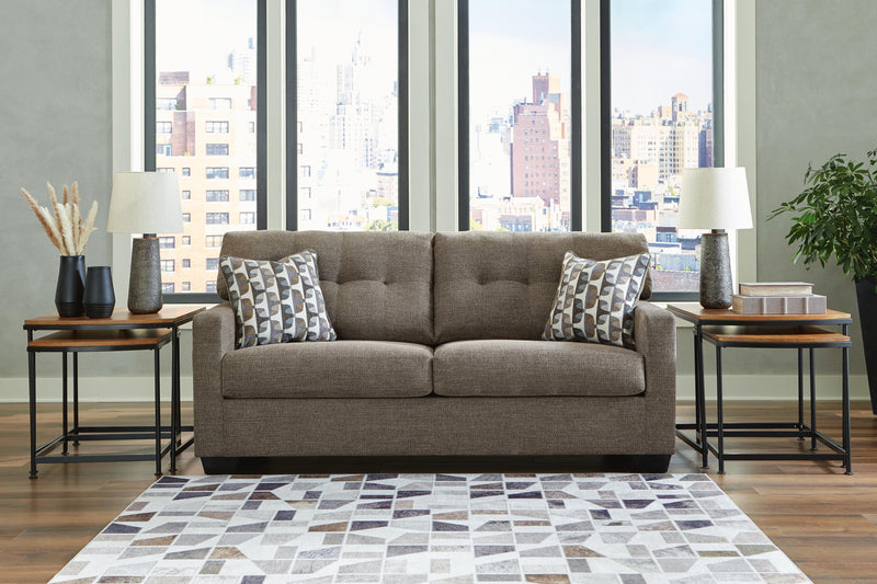 Ashley Furniture Mahoney living room set with plush sofa and matching armchair, featuring neutral fabric and modern design.