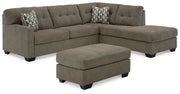 Ashley Furniture Mahoney living room set with plush sofa, armchair, and coordinating coffee table in a modern design.