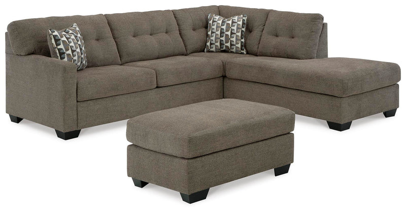 Ashley Furniture Mahoney living room set with plush sofa, armchair, and coordinating coffee table in a modern design.