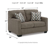 Ashley Furniture Mahoney living room set featuring a sofa and loveseat with plush cushions and modern design.