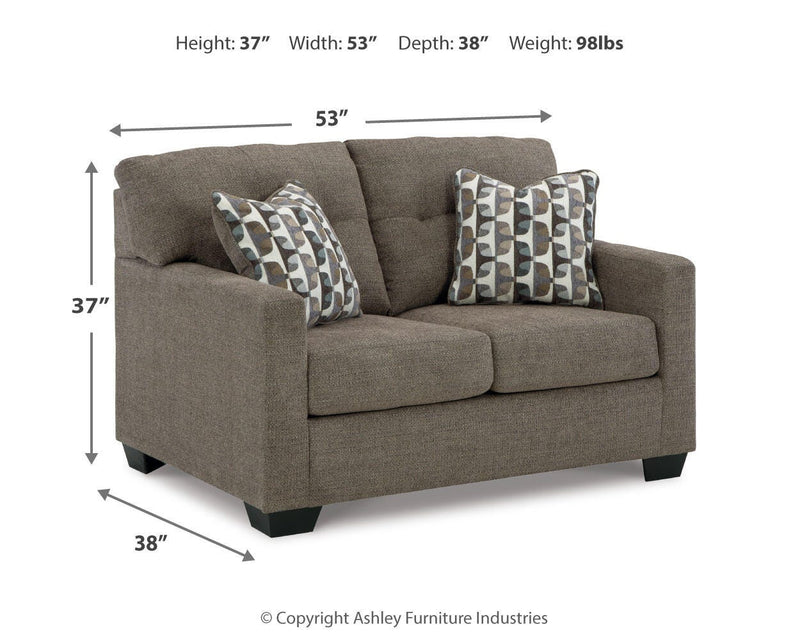 Ashley Furniture Mahoney living room set featuring a sofa and loveseat with plush cushions and modern design.