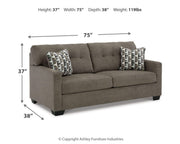Mahoney Ashley Furniture living room set with sofa and armchair in a modern design, featuring neutral upholstery and stylish accents.