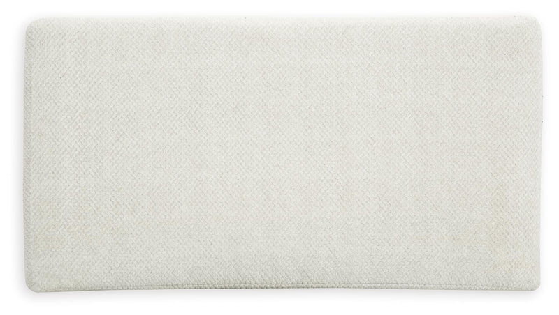 Ashley Furniture Karinne oversized accent ottoman with plush fabric top and sturdy wooden legs, ideal for living room decor.