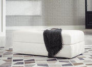 Karinne oversized accent ottoman by Ashley Furniture with plush fabric and stylish design, shown in a neutral color.