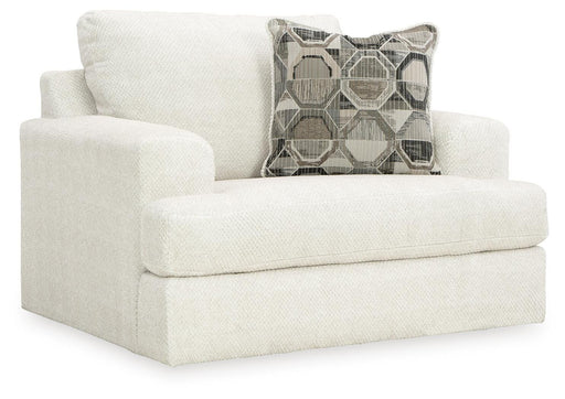 Ashley Furniture Karinne oversized chair with plush upholstery and wide armrests, shown from an angled view.