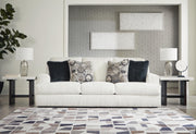 Ashley Furniture Karinne Sofa with plush fabric and modern design, featuring clean lines and comfortable seating.