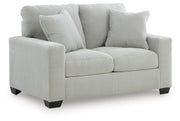 Ashley Furniture Greenbriar living room set with sofa and armchair, featuring plush cushions and modern design, angled view.