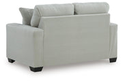 Ashley Furniture Greenbriar living room set featuring a sofa and matching armchair with plush upholstery and modern design.