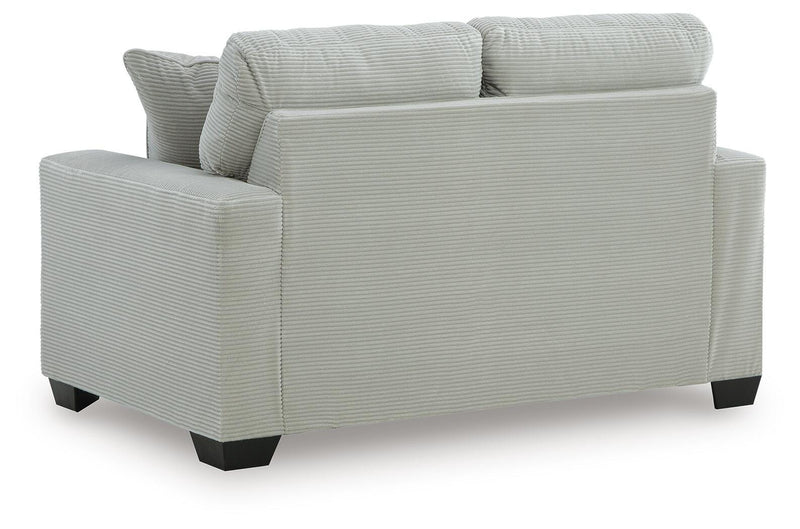 Ashley Furniture Greenbriar living room set featuring a sofa and matching armchair with plush upholstery and modern design.