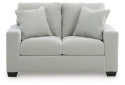 Greenbriar living room set by Ashley Furniture with a sofa and armchair in a modern living room setting.