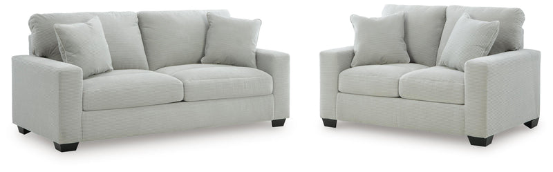 Ashley Furniture Greenbriar living room set with sofa, loveseat, and armchair arranged in a cozy, modern living space.