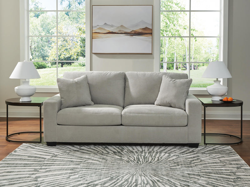 Ashley Furniture Greenbriar living room set with sofa and loveseat featuring green upholstery and wooden legs, modern and comfortable design.
