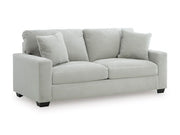 Ashley Furniture Greenbriar living room set with sofa and armchair, shown from an angled view in a stylish living space.