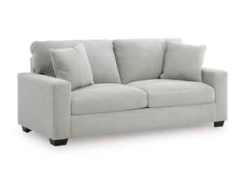 Ashley Furniture Greenbriar living room set with sofa and armchair, shown from an angled view in a stylish living space.