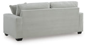 Greenbriar Ashley Furniture living room set with sofa and armchair, featuring green upholstery and modern design.