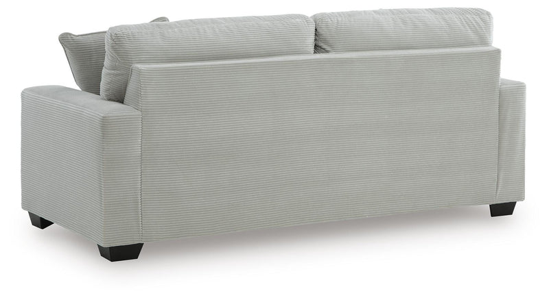 Greenbriar Ashley Furniture living room set with sofa and armchair, featuring green upholstery and modern design.