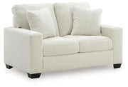 Ashley Furniture Greenbriar living room set with a sofa and matching chairs, upholstered in neutral fabric with wood accents.