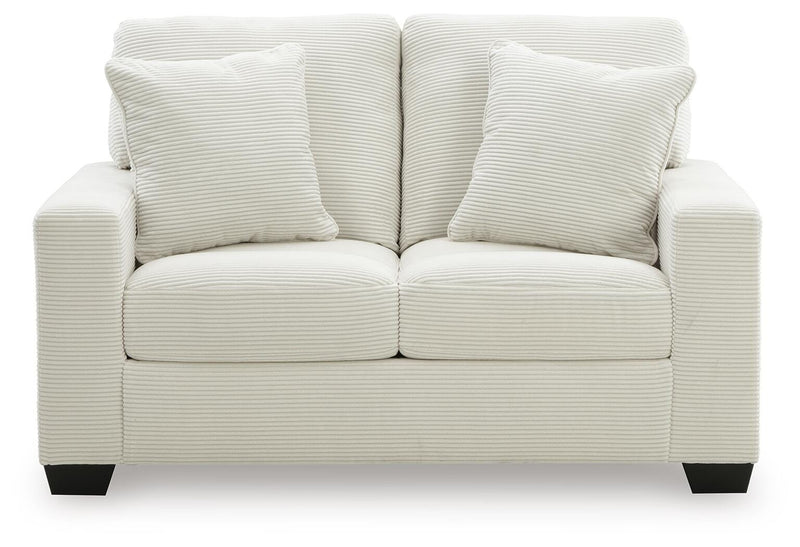 Ashley Furniture Greenbriar living room set, sofa and loveseat with green upholstery and wooden legs, modern home decor style