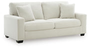 Ashley Furniture Greenbriar living room set with upholstered sofa and loveseat, angled view showcasing modern design and fabric texture.