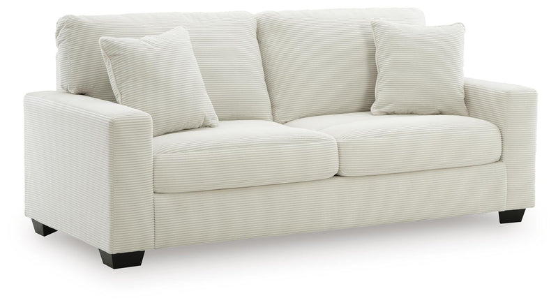 Ashley Furniture Greenbriar living room set with upholstered sofa and loveseat, angled view showcasing modern design and fabric texture.
