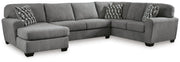Ashley Furniture Birkdale Court sectional with chaise, featuring plush cushions and a modern design in a cozy living room setting.