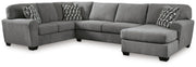 Ashley Furniture Birkdale Court sectional with chaise, showing plush gray upholstery and modern design in a stylish living room setting.