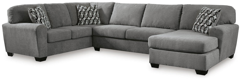 Ashley Furniture Birkdale Court sectional with chaise, showing plush gray upholstery and modern design in a stylish living room setting.