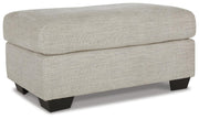 Ashley Furniture Vayda living room set with plush sofa and matching armchair, shown from an angled view in a stylish living space.