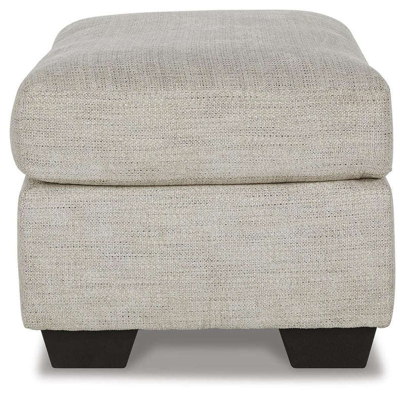 Ashley Furniture Vayda living room set with sofa and armchair in neutral fabric and modern design, shown in a stylish living space.