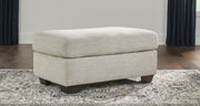 Ashley Furniture Vayda living room set with sofa and armchair featuring neutral fabric and modern design.