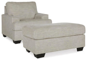 Ashley Furniture Vayda living room set with sofa and armchair, featuring modern design and plush cushions.