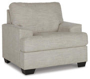 Ashley Furniture Vayda living room set featuring a sofa and loveseat with neutral fabric, modern design, and plush cushions.