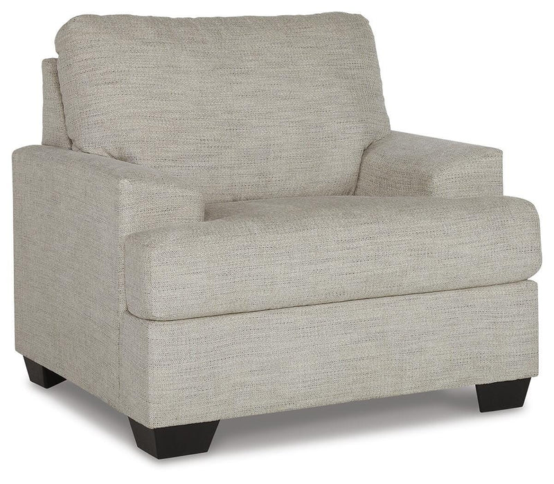 Ashley Furniture Vayda living room set featuring a sofa and loveseat with neutral fabric, modern design, and plush cushions.