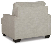 Ashley Furniture Vayda living room set with sofa and armchair, featuring neutral upholstery and modern design.