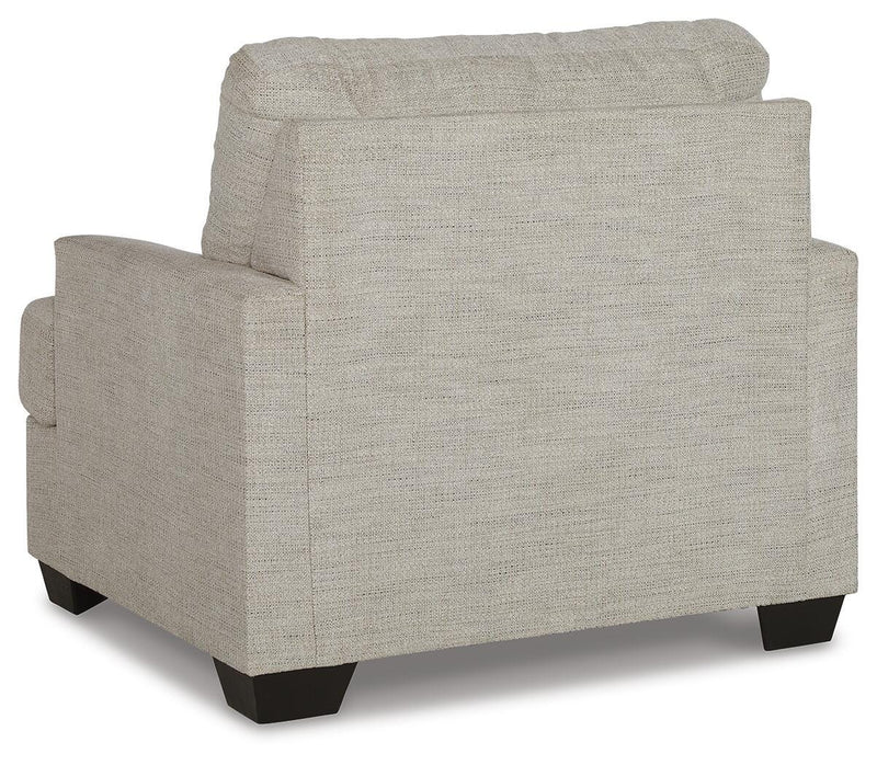 Ashley Furniture Vayda living room set with sofa and armchair, featuring neutral upholstery and modern design.