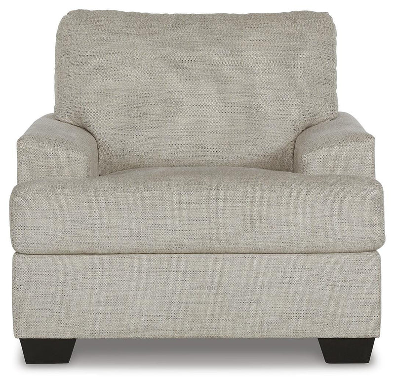 Ashley Furniture Vayda living room set with sofa and loveseat, featuring plush cushions and modern design.