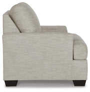 Ashley Furniture Vayda living room set with sofa and armchair in a modern design, featuring neutral fabric upholstery.