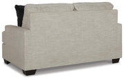 Ashley Furniture Vayda living room set with sofa and armchair, featuring neutral fabric and modern design.